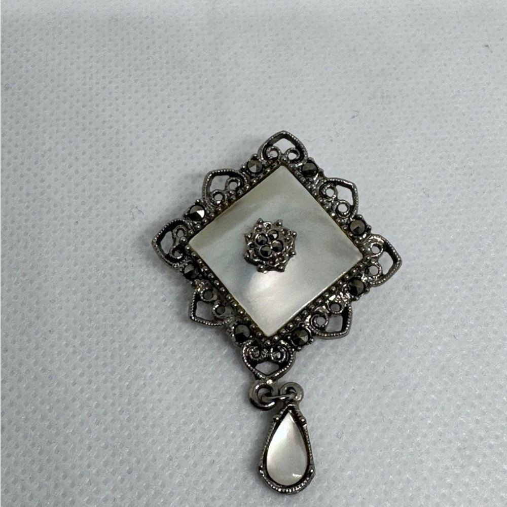 Elegant Silver and White vintage Brooch